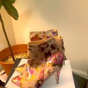 Rouge size 8.5 blush booties featuring floral patterns.